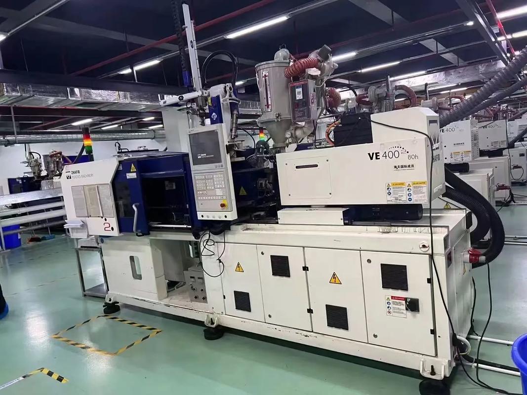 工廠里5臺40噸海天長飛亞全電動注塑機,適合高精密電子產品